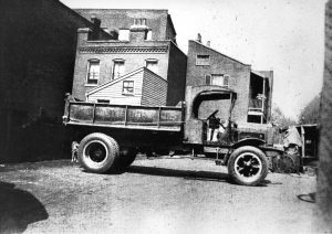 Pic 1 - 5 Ton White Dumpster Truck - 7th & Broadway - 1919-min